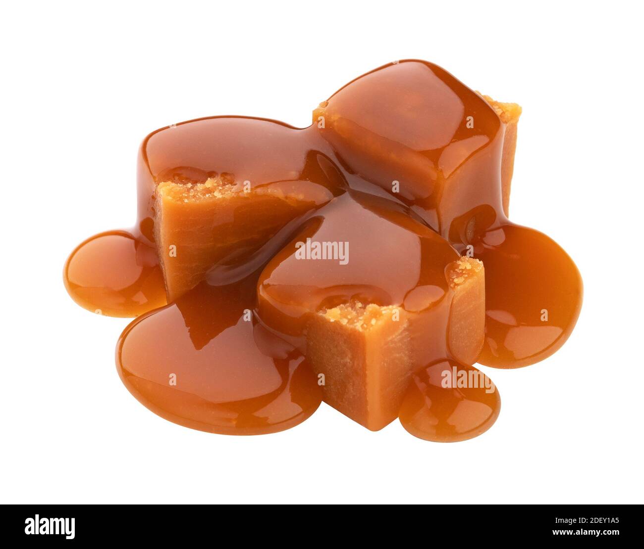 Caramel candy with caramel sauce isolated on white background Stock