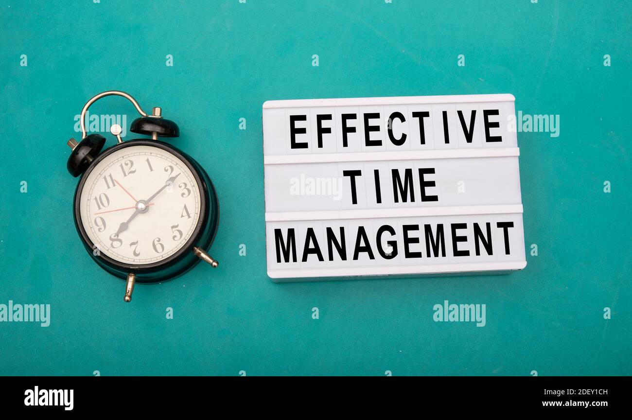 Effective time management sign with black clock on side Stock Photo
