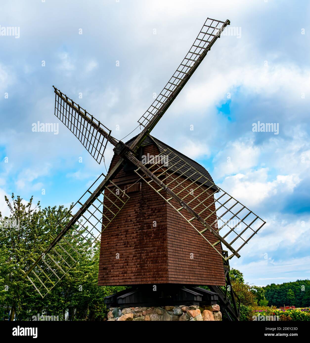 Traditional medieval wind mill for milling flour from wheats. . High quality photo Stock Photo