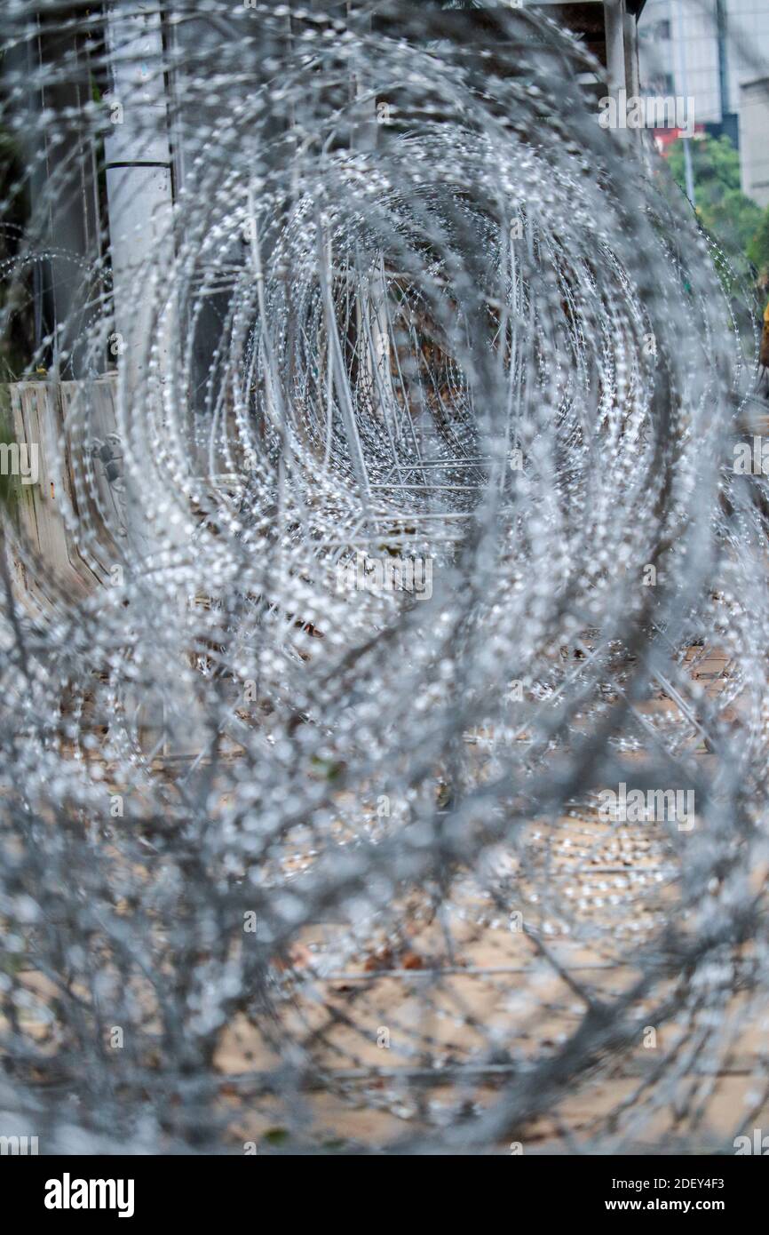 Barbed wire made of metal which is used to hold protesters Stock Photo