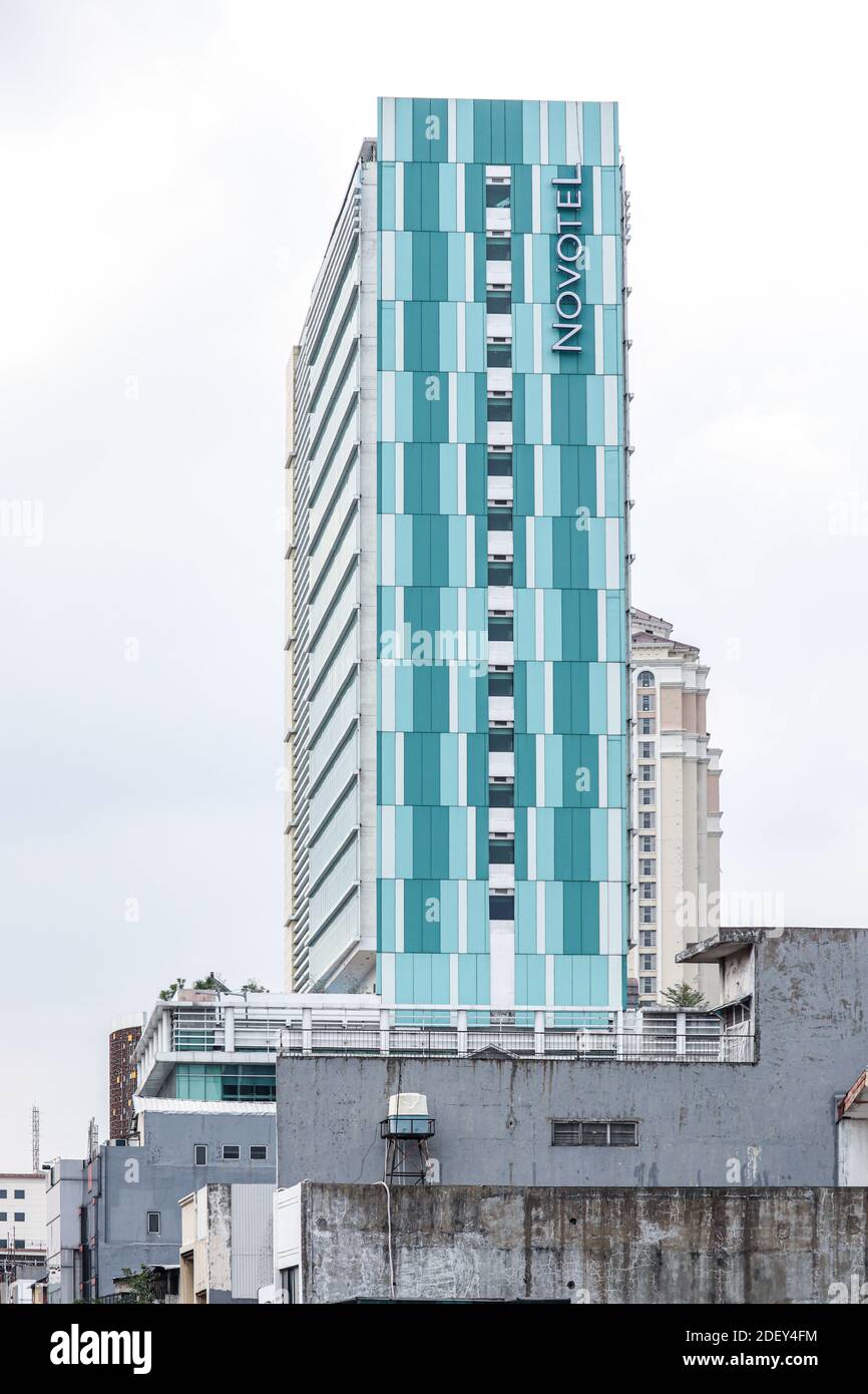 Jakarta / Indonesia - October 25, 2020. The hotel building is light blue with the name Novotel which is located in North Jakarta Stock Photo