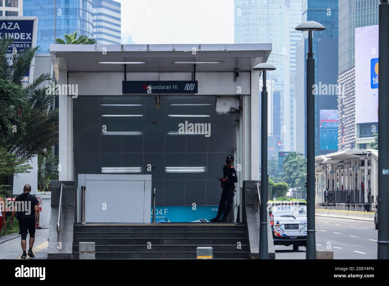 Jakarta / Indonesia - 25 October 2020. The entrance of the Jakarta MRT Station is located at the HI roundabout with security on guard at the entrance. Stock Photo