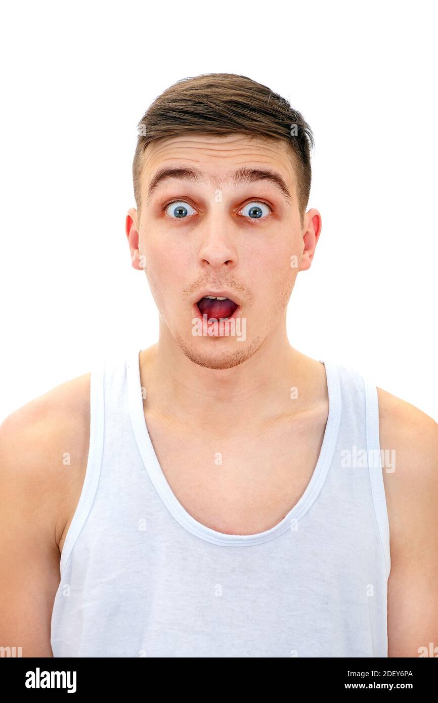 Surprised Young Man in the Undershirt Isolated on the White Background Stock Photo