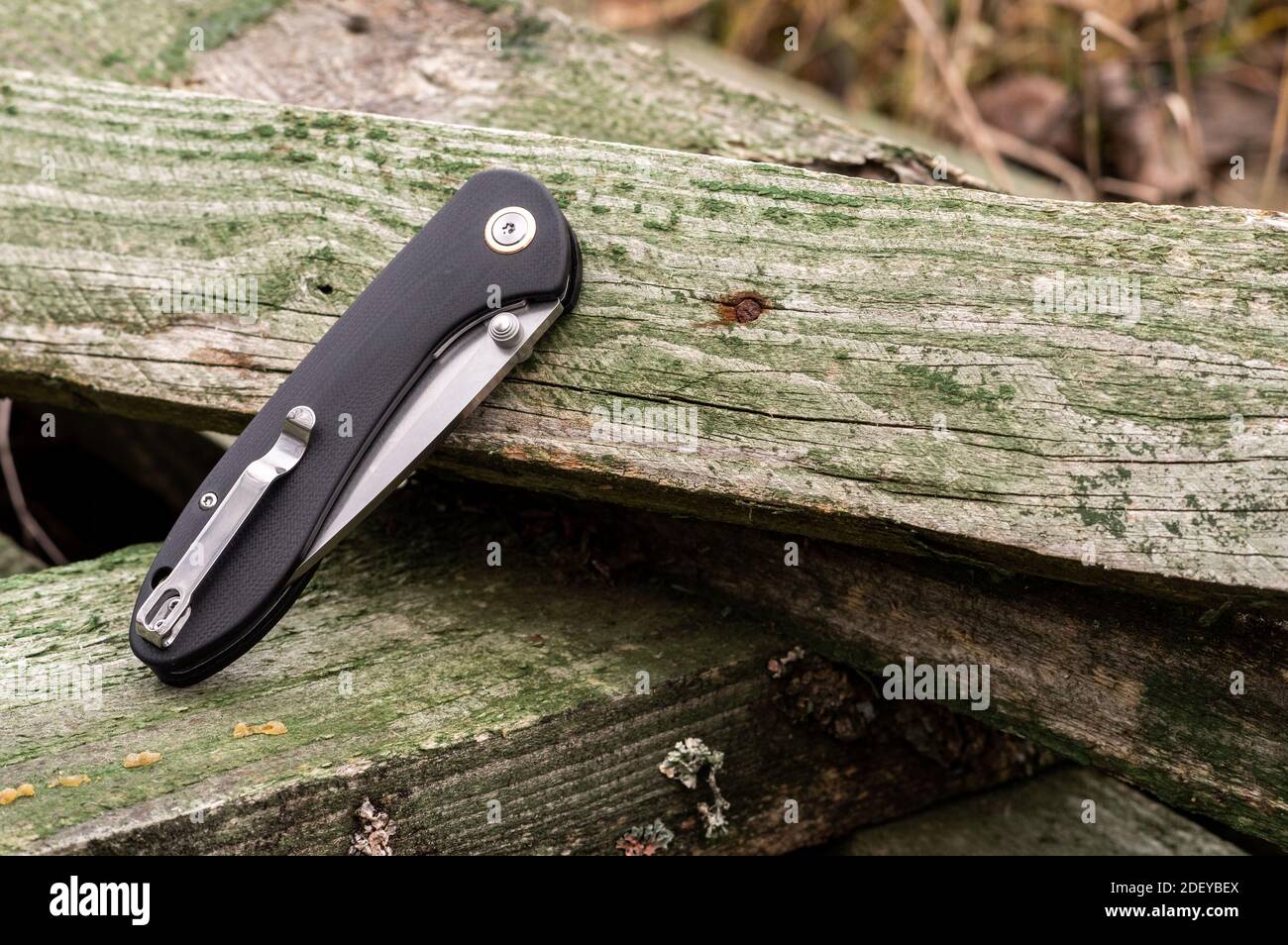 Pocket knife in folded position. Pocket knife. Clip for carrying Stock