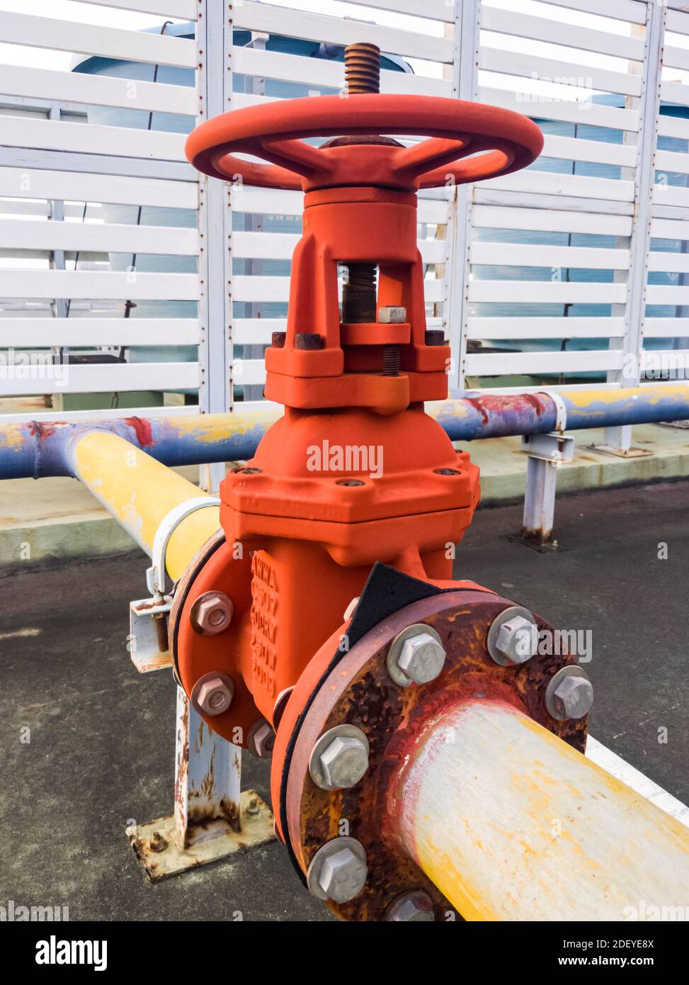 Large water valve with the handle wheel for control the water supply system of the office building. Stock Photo