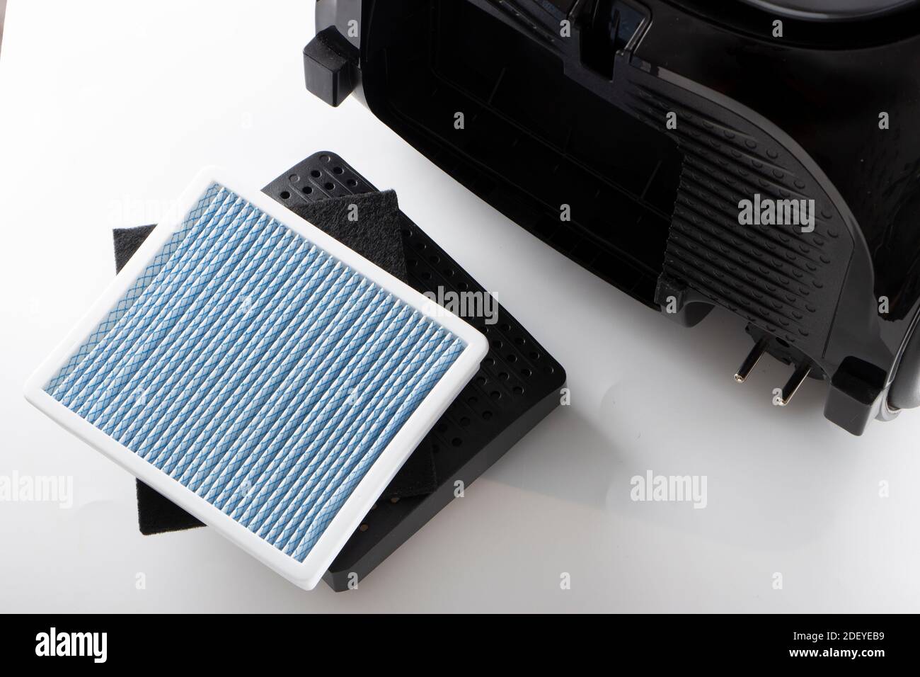 dirty dust filter. vacuum cleaner filter on white background Stock