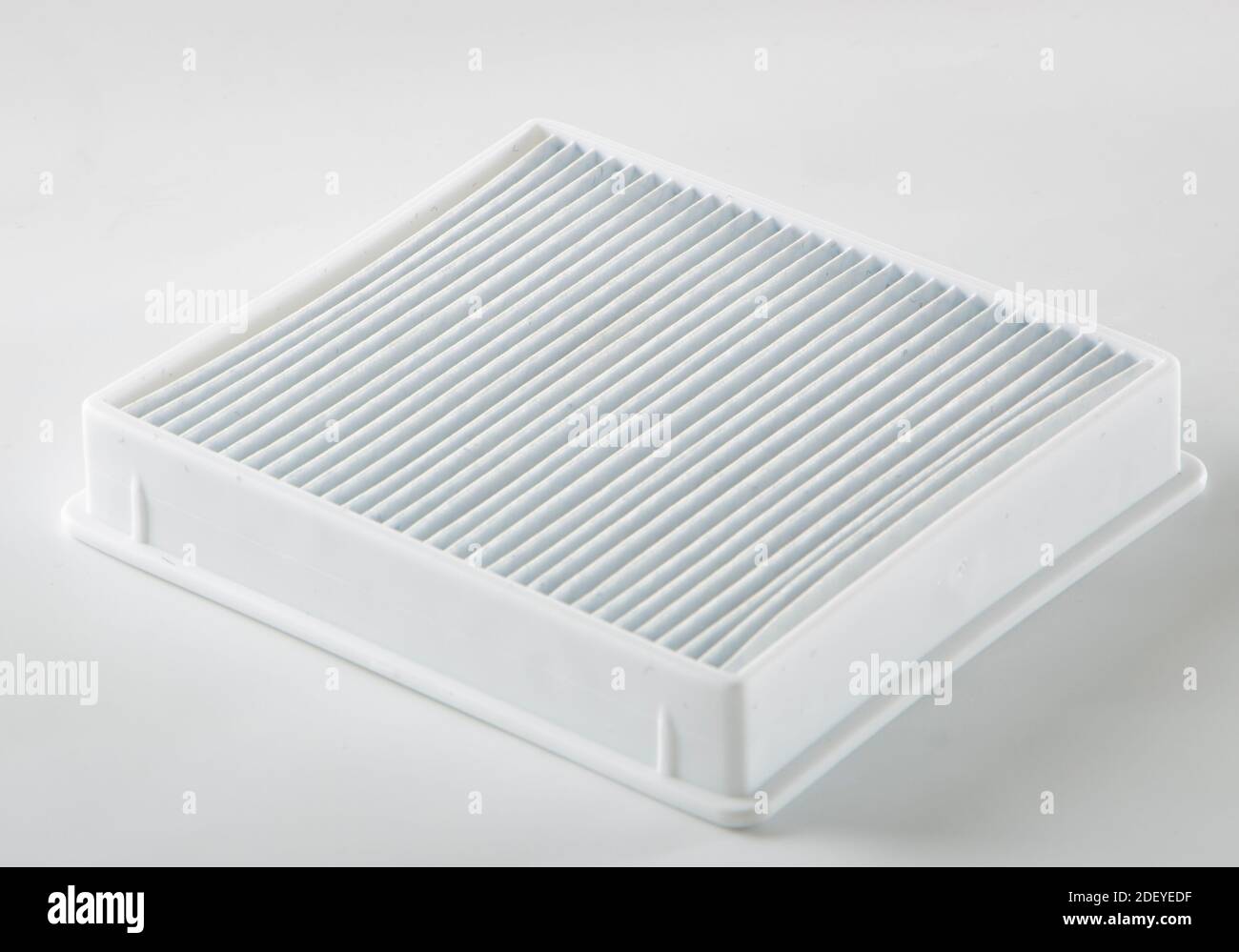dirty dust filter. vacuum cleaner filter on white background Stock