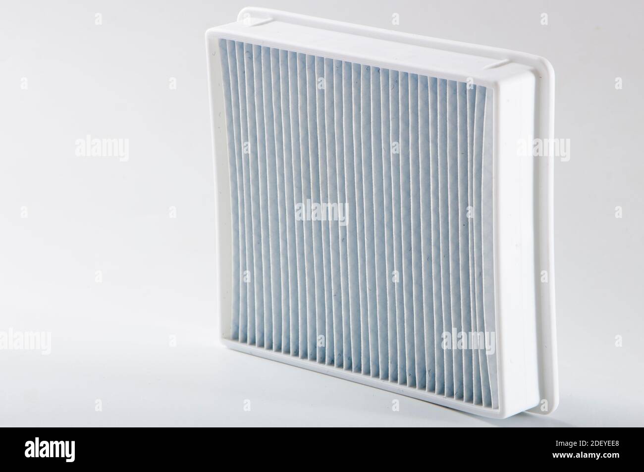 dirty dust filter. vacuum cleaner filter on white background Stock