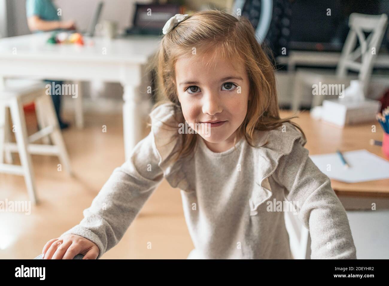 Stock photo of cute little girl smiling and looking at camera Stock ...