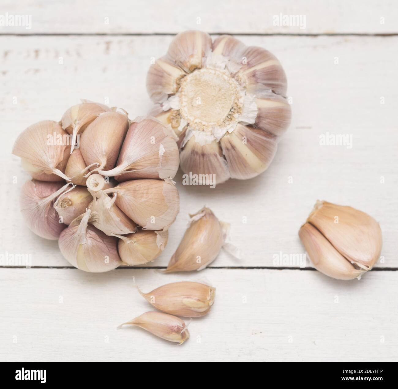 Garlic on wooden background Stock Photo