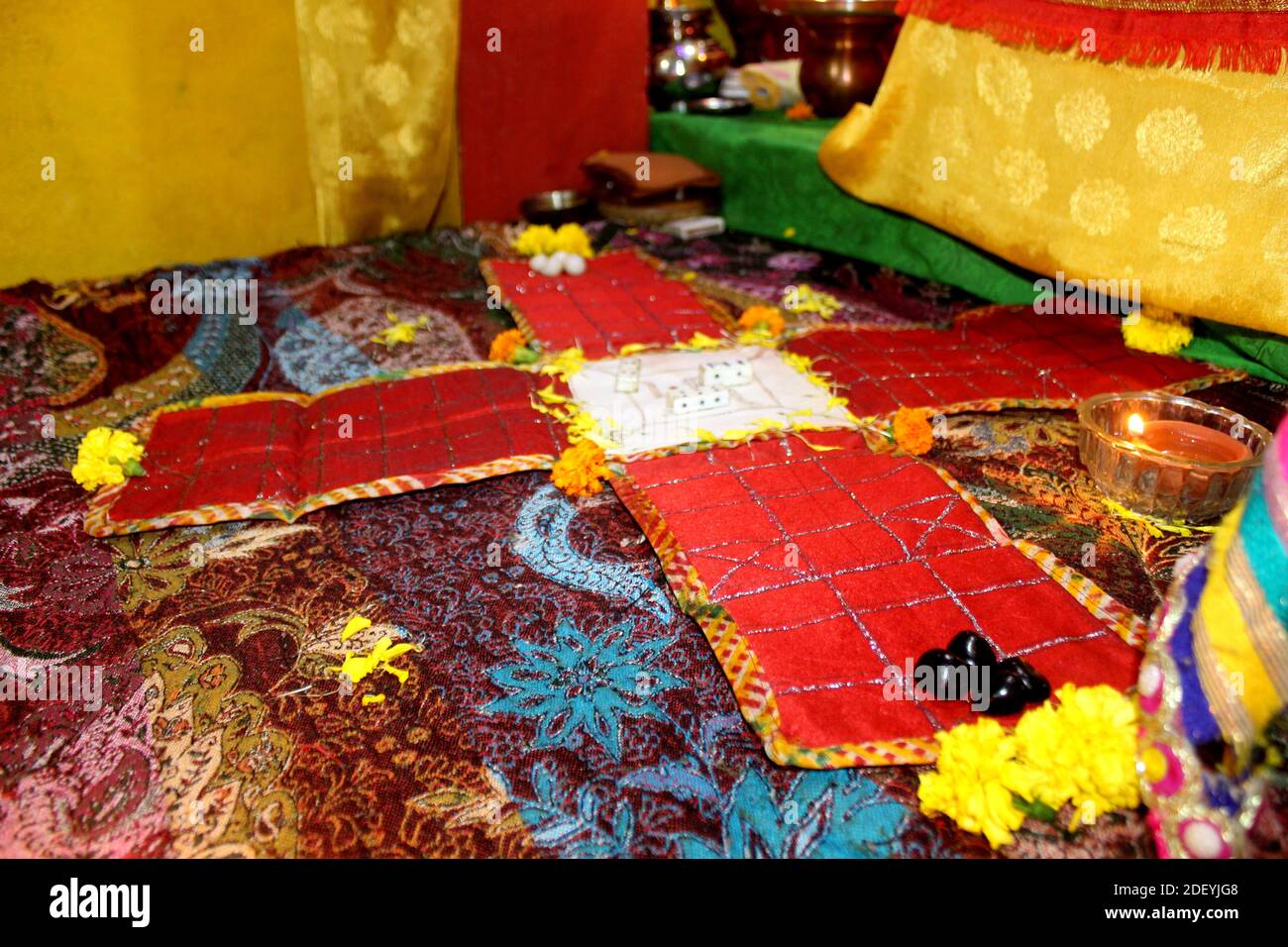 Chaupar/chopad is a cross and circle board game similar to pachisi, Traditional game played in