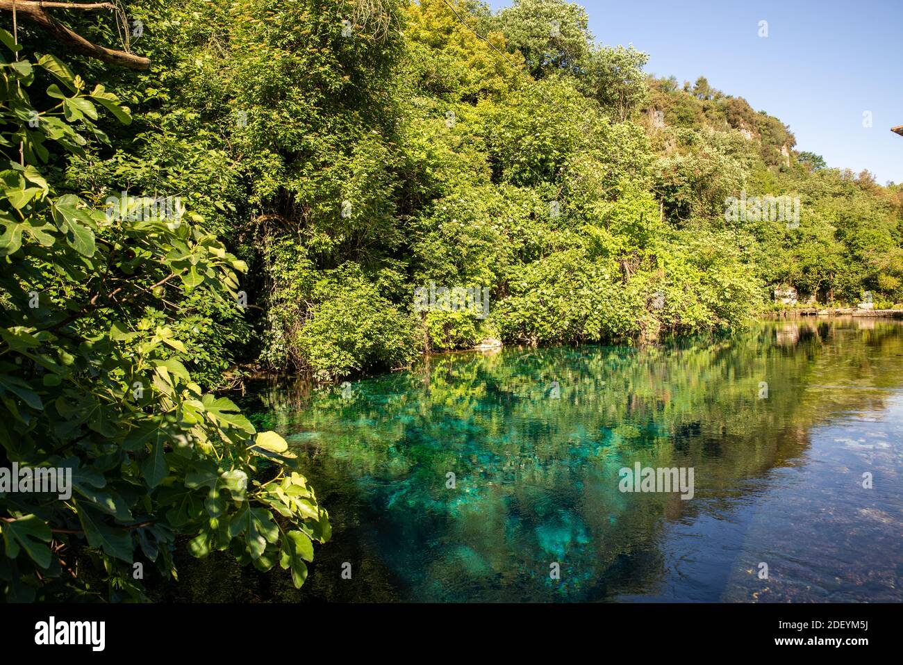 styphon river with clear, blue water where children bathe and picnic in