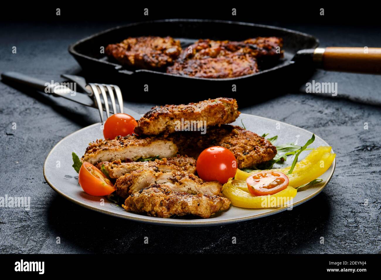 Pork chop fillet baked in oven with seasoning and herbs Stock Photo Alamy