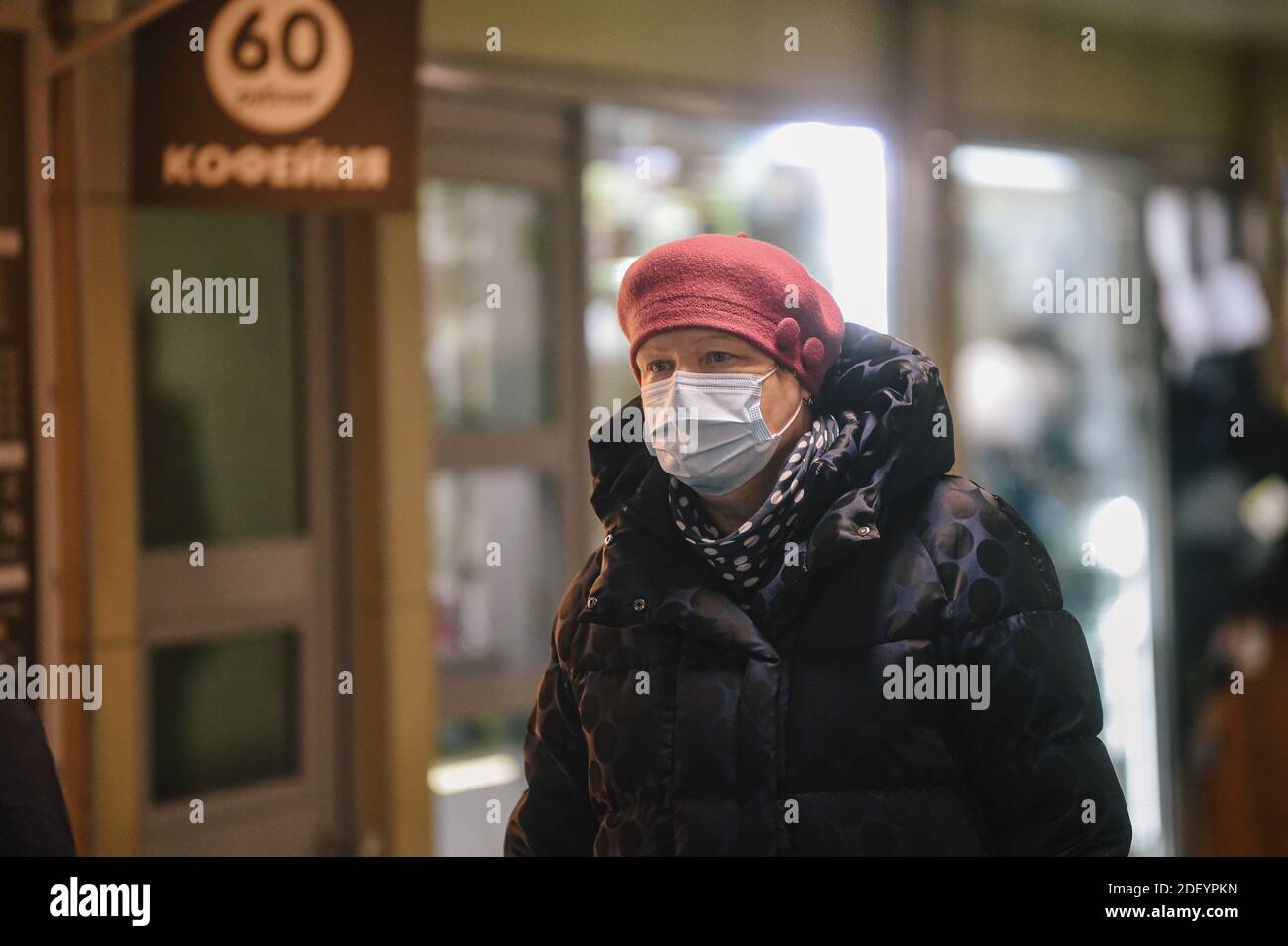 (201202) -- MOSCOW, Dec. 2, 2020 (Xinhua) -- A woman wearing a protective mask walks on the street in Moscow, Russia, on Dec. 2, 2020. Russia recorded 25,345 more COVID-19 infections over the past 24 hours, bringing the national tally to 2,347,401, the country's COVID-19 response center said Wednesday. (Xinhua/Evgeny Sinitsyn) Stock Photo