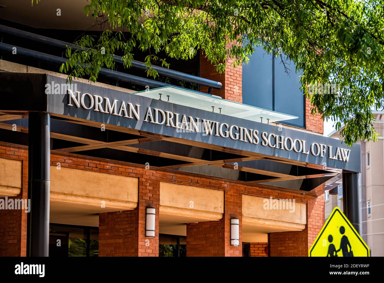 Raleigh, USA - May 13, 2018: Downtown North Carolina city with modern building for office building of Norman Adrian Wiggins school of lawn Campbell Un Stock Photo