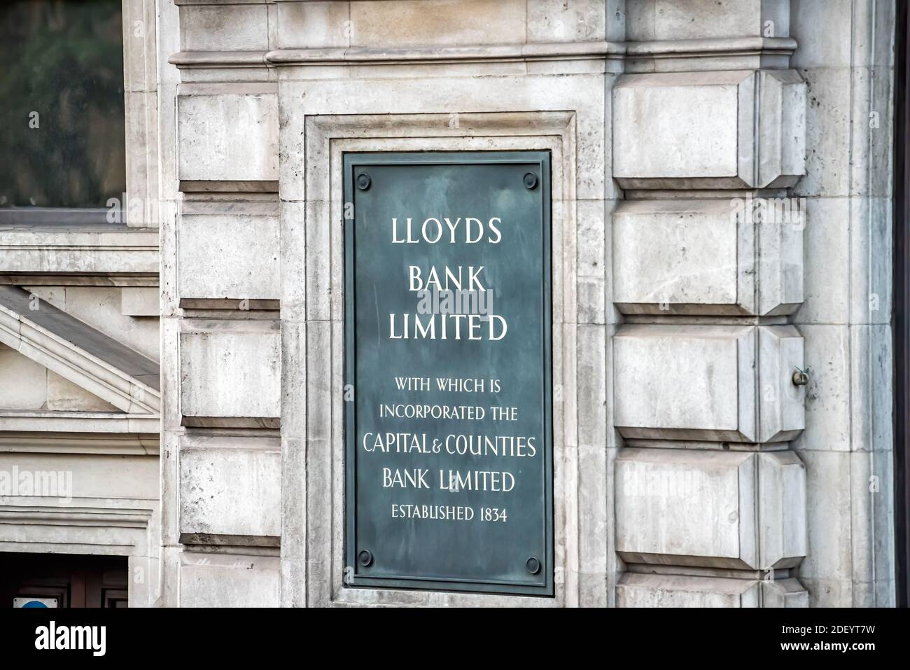 London, UK - June 22, 2018: Closeup of Lloyds Bank sign branch office in downtown city in England with text for limited incorporated capital of counti Stock Photo