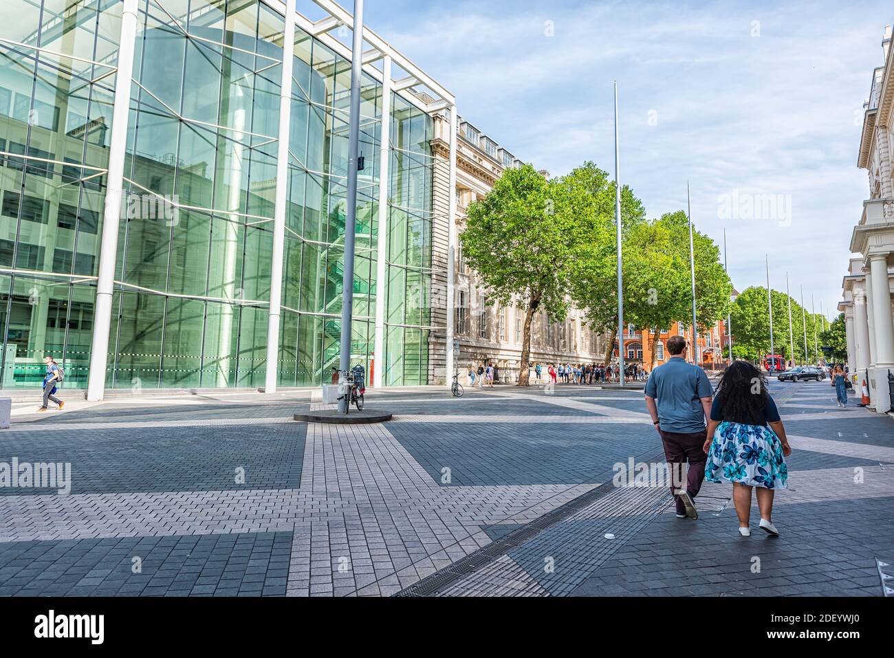 London, UK - June 24, 2018: Imperial College Business school main entrance building with people walking at Exhibition road sidewalk in Chelsea and Ken Stock Photo