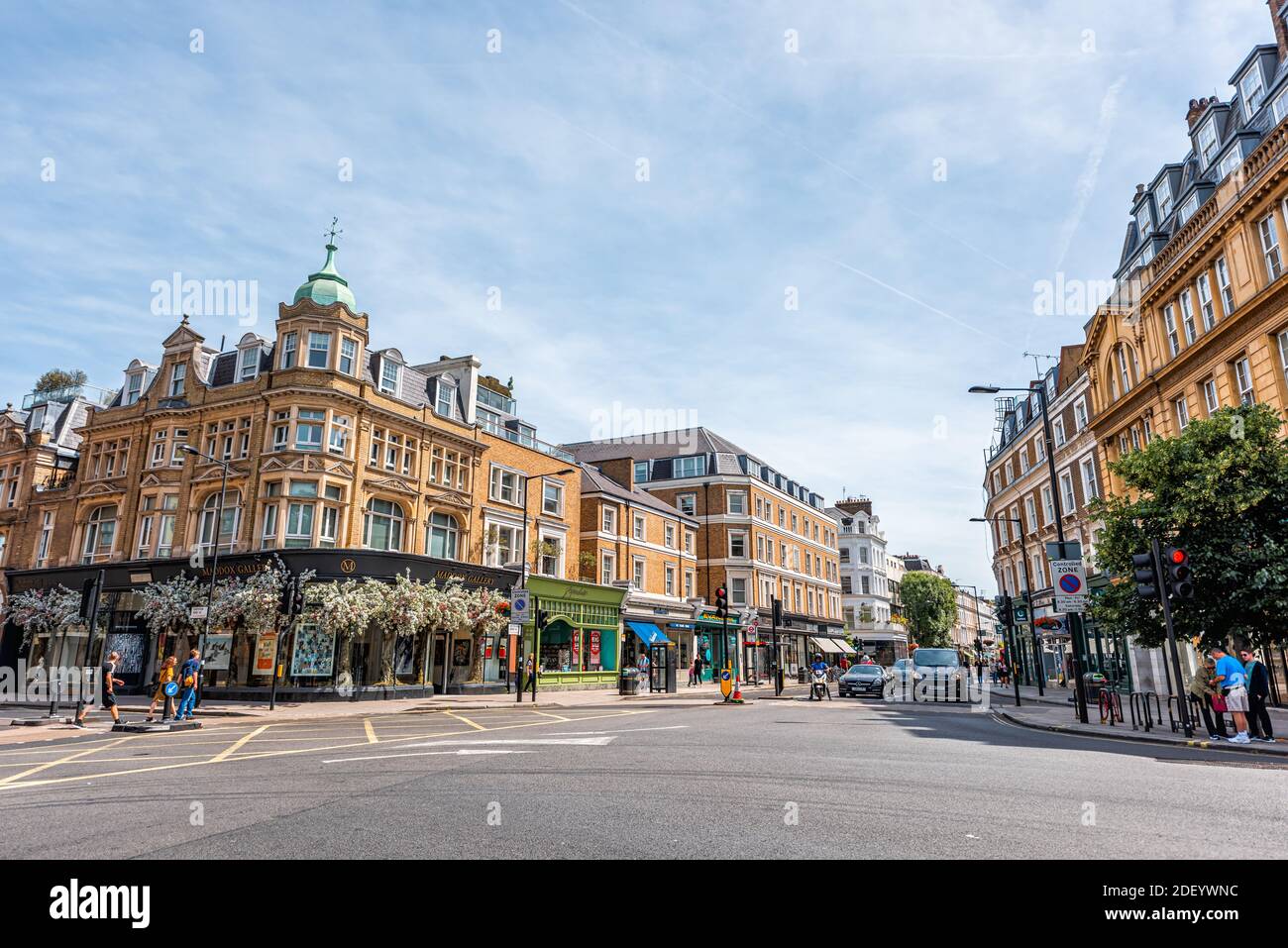 London, UK - June 24, 2018: Notting Hill intersection of Westbourne Grove and Chepstow place street roads with people walking by art gallery, stores b Stock Photo