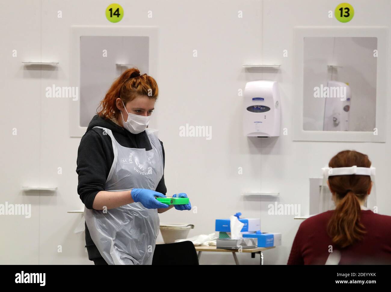 People carry out asymptomatic testing using lateral flow antigen at a