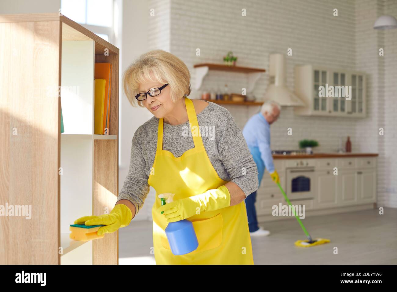 Elderly couple home cleaning hi-res stock photography and images - Alamy