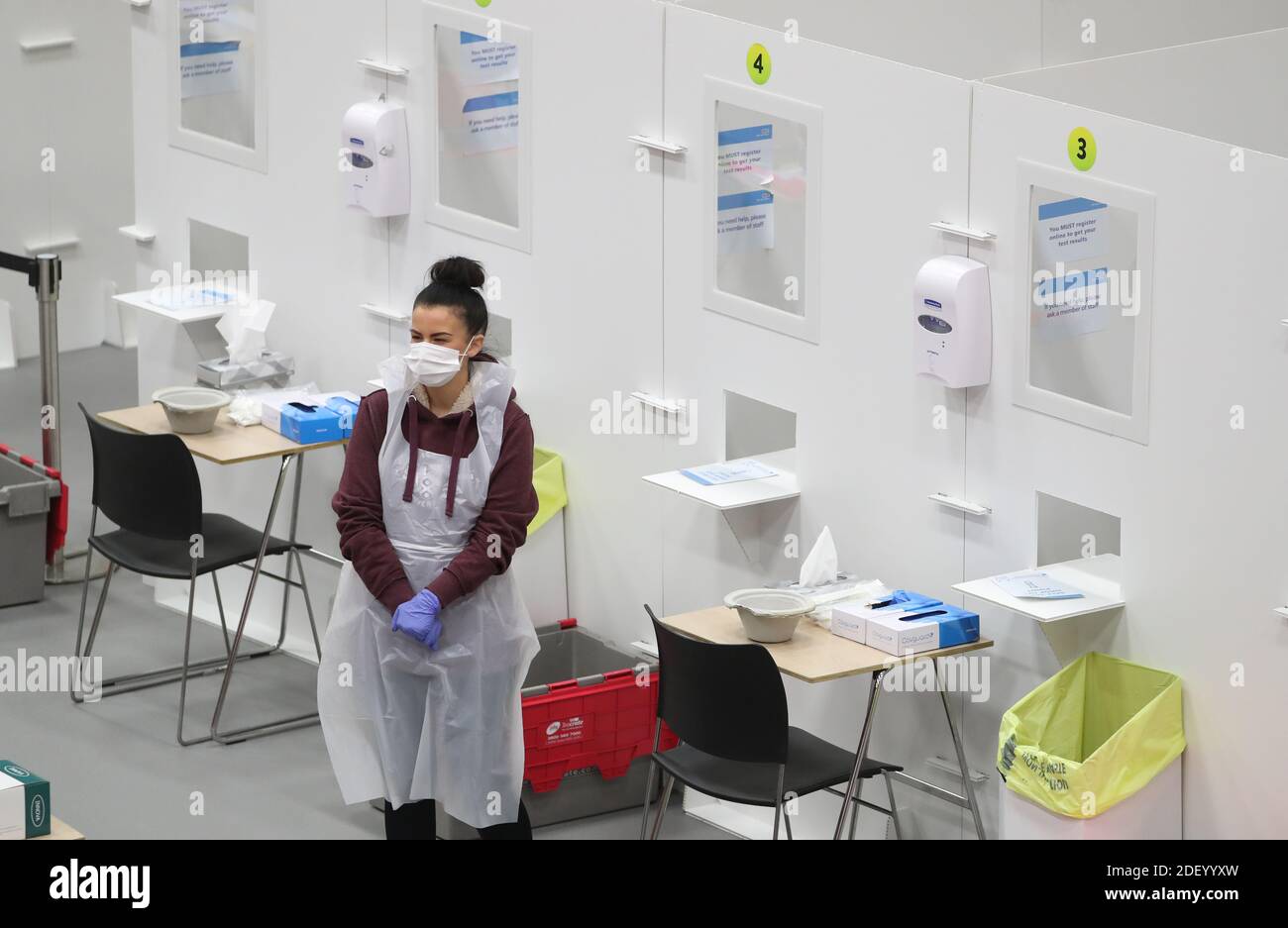 People carry out asymptomatic testing using lateral flow antigen at a