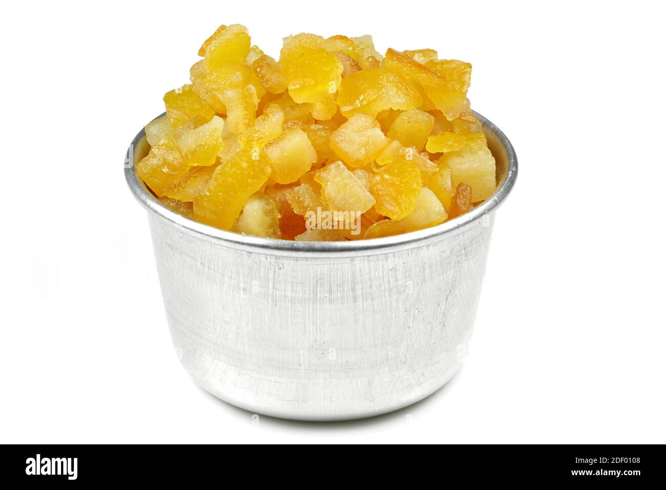 candied orange peel in an aluminium bowl isolated on white background Stock Photo