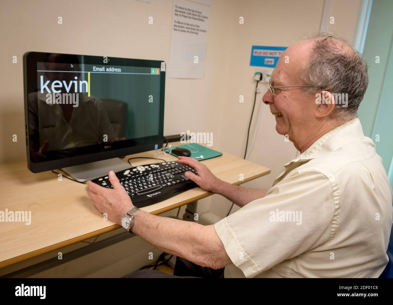 A man using a computer screen for visually impaired people Stock Photo
