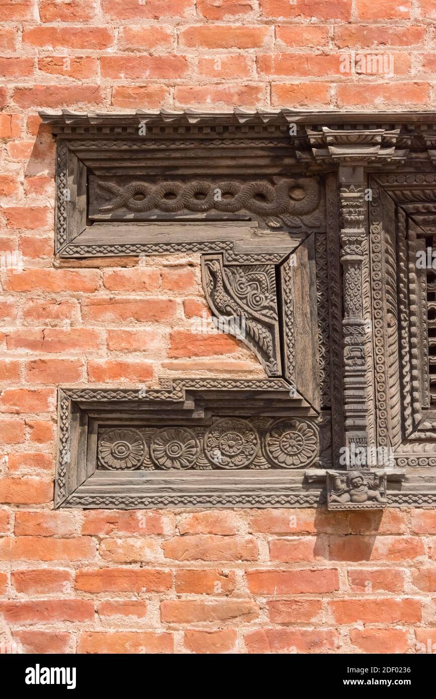 Traditional architectural style of brick and wood carving on temple in Bhaktapur Durbar Square, UNESCO World Heritage site, Bhaktapur, Nepal Stock Photo