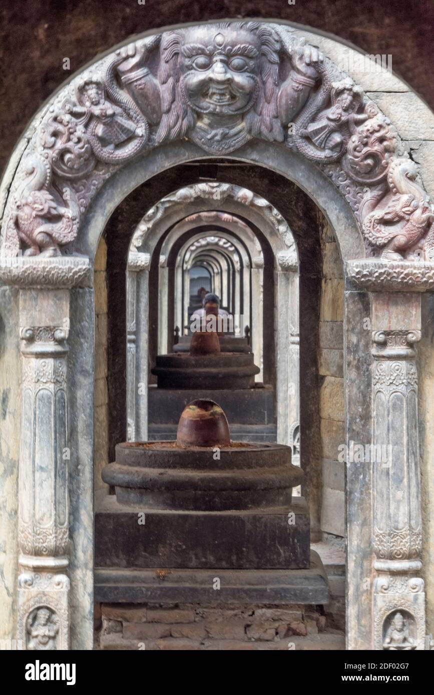 Arch corridor in Pashupatinath Temple, UNESCO World Heritage site, (It is believed that a Hindu cremated here would be reborn as a Human in his next b Stock Photo