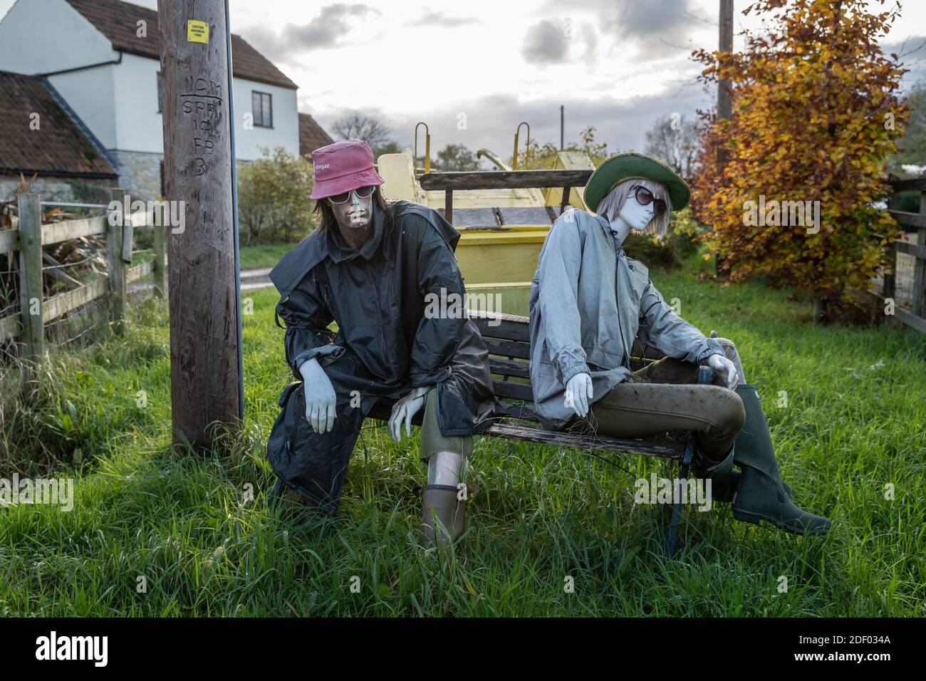 Coronavirus: Lockdown scarecrow characters bring some local homemade humour to the town of Marston Magna in Somerset, UK. Stock Photo