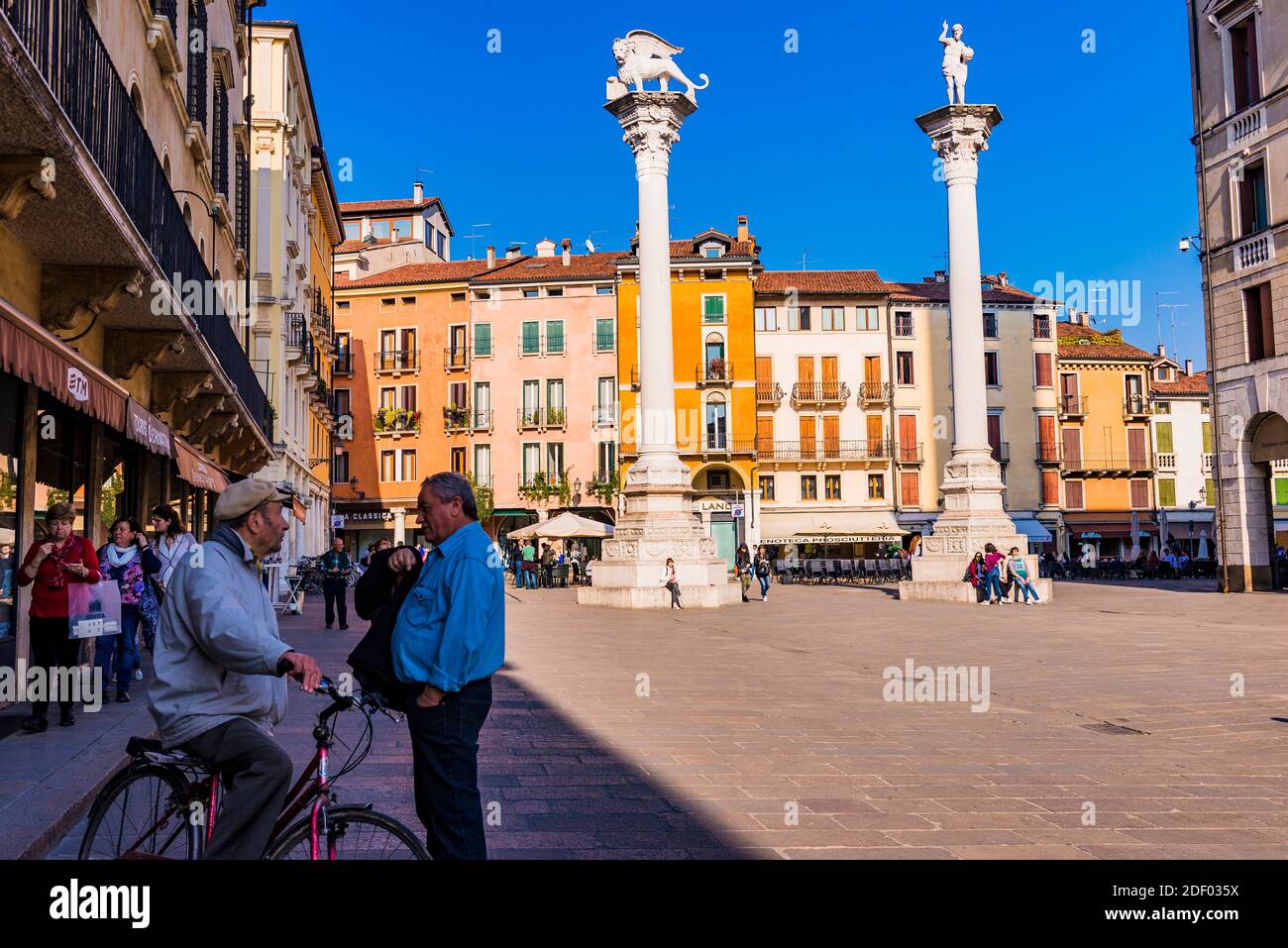 Piazza dei Signori, city square. The two columns, on the left the winged lion, symbol of Saint Mark and the Republic of Venice. Rigt, the redentore, C Stock Photo