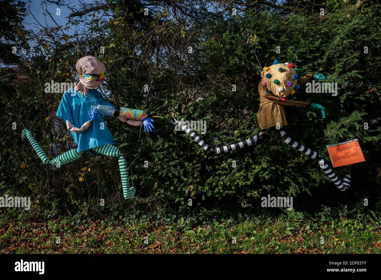 Coronavirus: Lockdown scarecrow characters bring some local homemade humour to the town of Marston Magna in Somerset, UK. Stock Photo