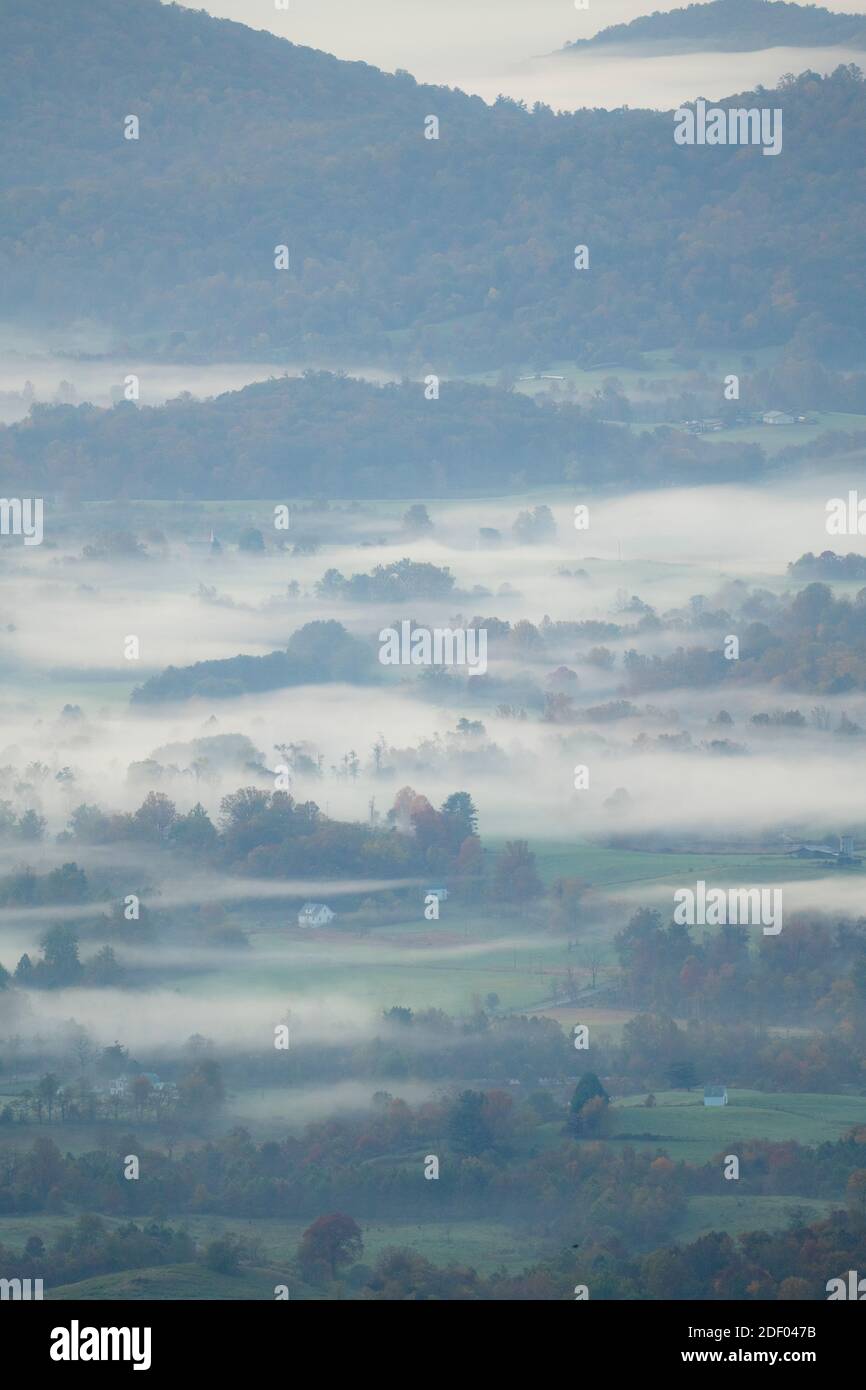 Autumn morning mist shrouds the Shenandoah Mountains in the Blue Ridge Mountains of Virginia. Stock Photo