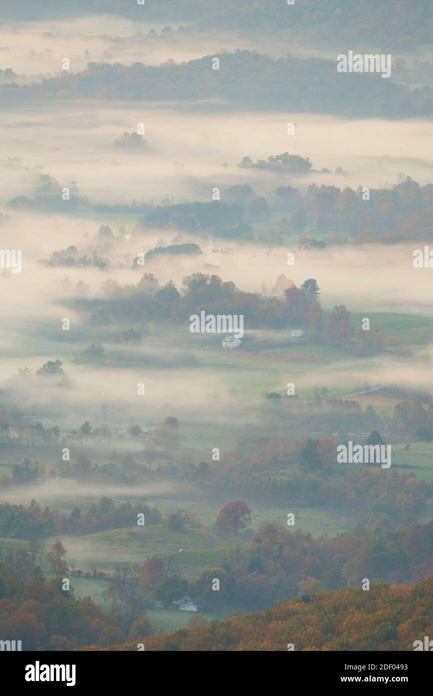 Autumn morning mist shrouds the Shenandoah Mountains in the Blue Ridge Mountains of Virginia. Stock Photo