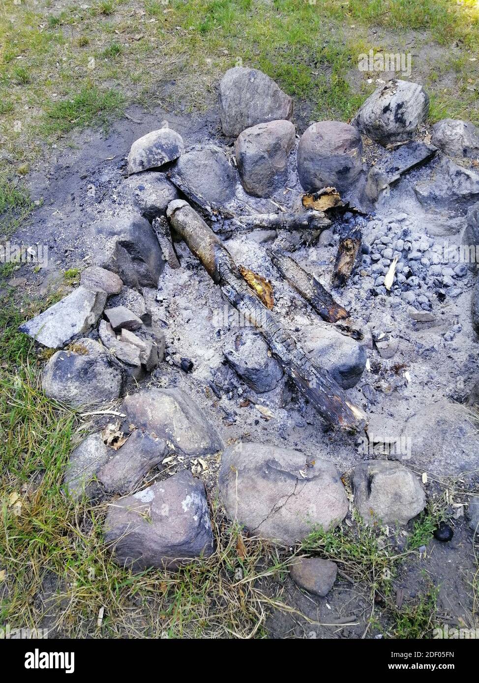 Burned fireplace with wood and coal Stock Photo Alamy