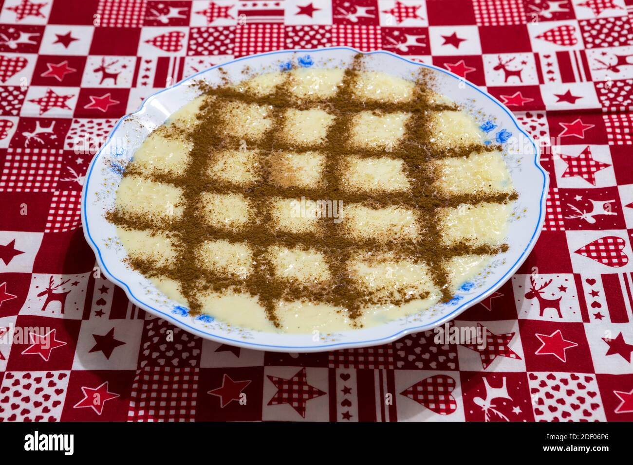 Delicious rice pudding 'arroz doce' on a christmas table. A typical christmas sweet Stock Photo