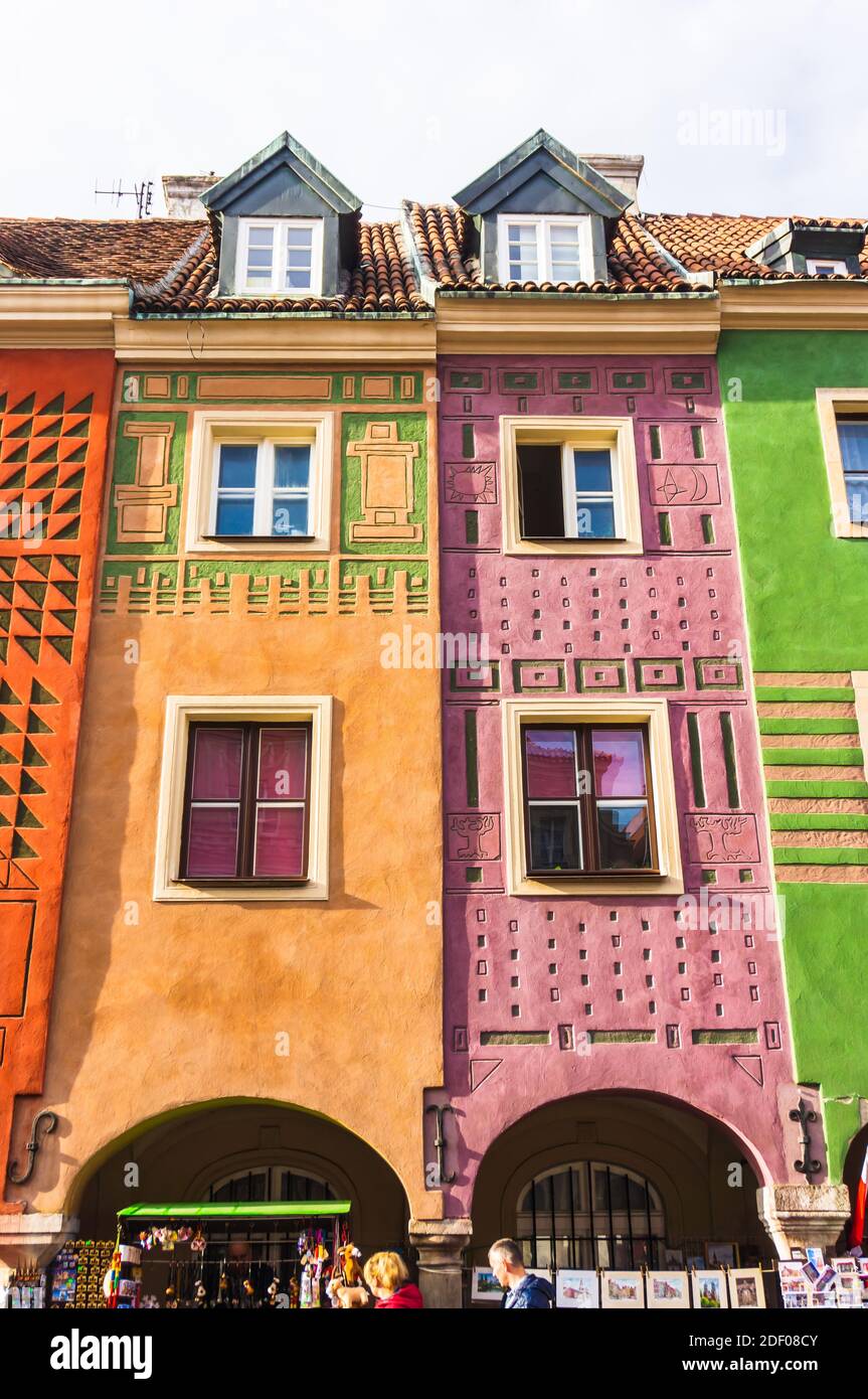 POZNAN, POLAND - Nov 12, 2018: Yellow and pink building in the old city square Stock Photo