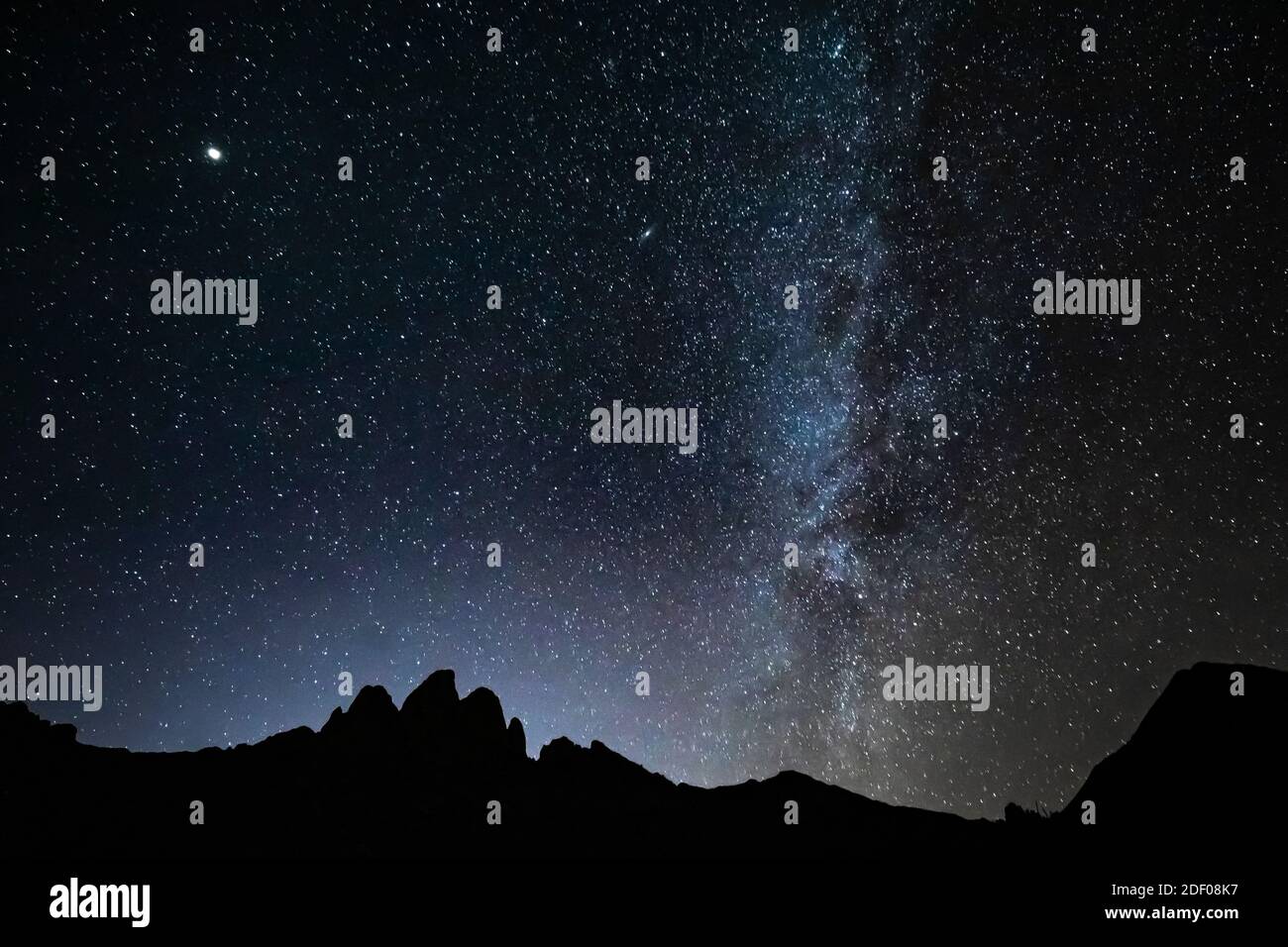 Starry night sky with Milky Way over Rabbit Ears, in the Oragan Mountains viewed from Aguirre Springs Campground, Organ Mountains-Desert Peaks Nationa Stock Photo