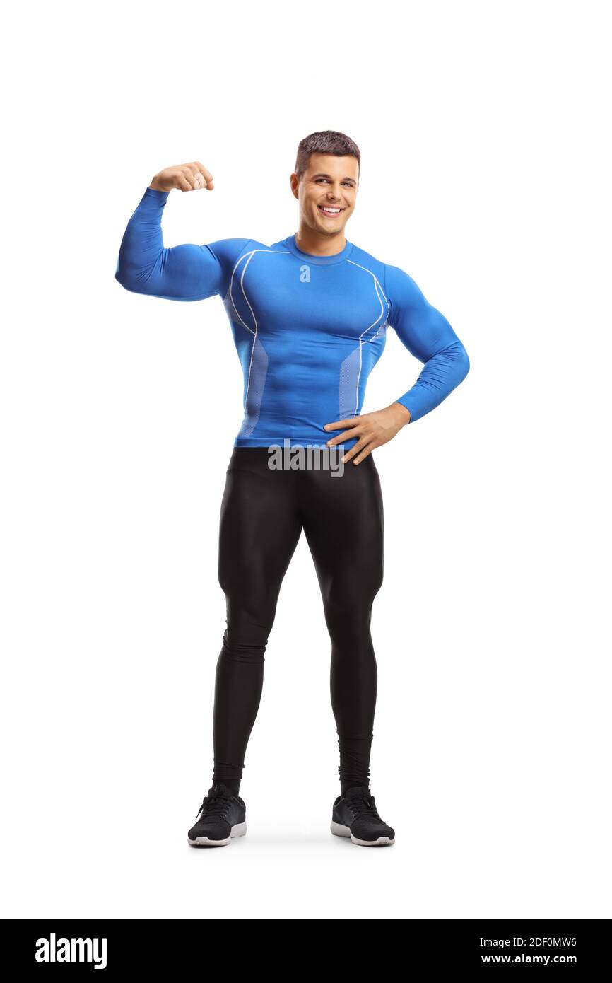 Full length portrait of a fit muscular man in leggings flexing arm muscles isolated on white background Stock Photo