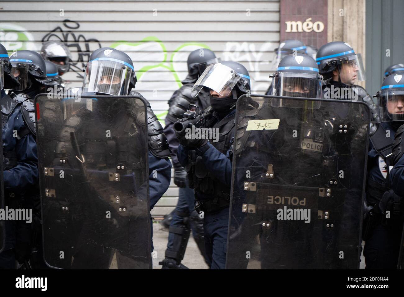 Policement watch demonstrators during a demonstration in Paris, France, on January 9, 2020, on the 36th day of a nationwide multi-sector strike against French government's pensions overhaul. Photo by Florent Bardos/ABACAPRESS.COM Stock Photo