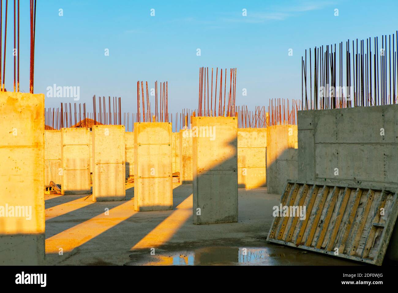construction of the building foundation, columns with reinforcement