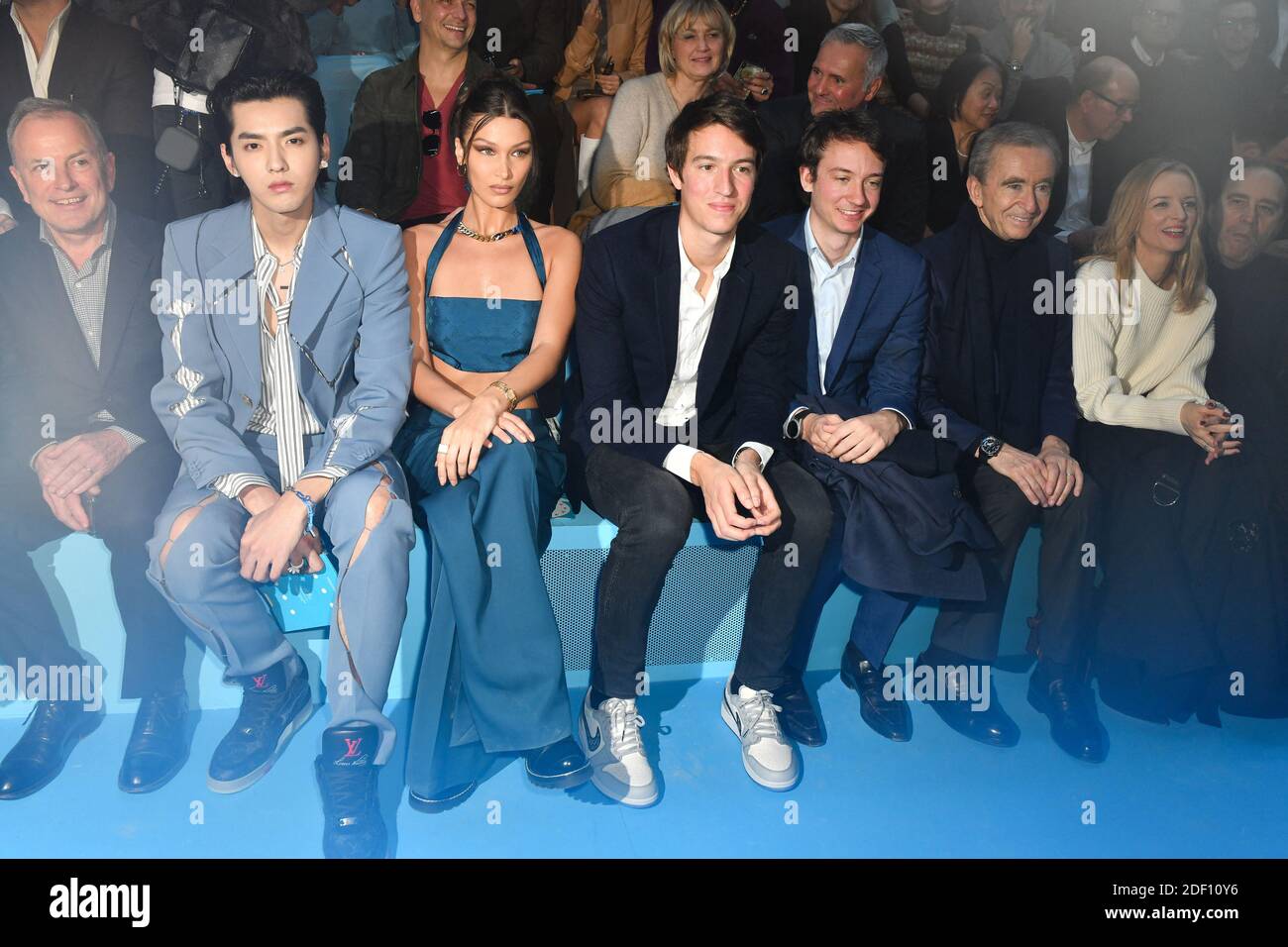 Actor Kris Wu and Model Bella Hadid, CEO of Rimowa, Alexandre Arnault,  Frederic Arnault and Owner of LVMH Luxury Group Bernard Arnault attend the  Louis Vuitton Menswear Fall/Winter 2020-2021 show as part