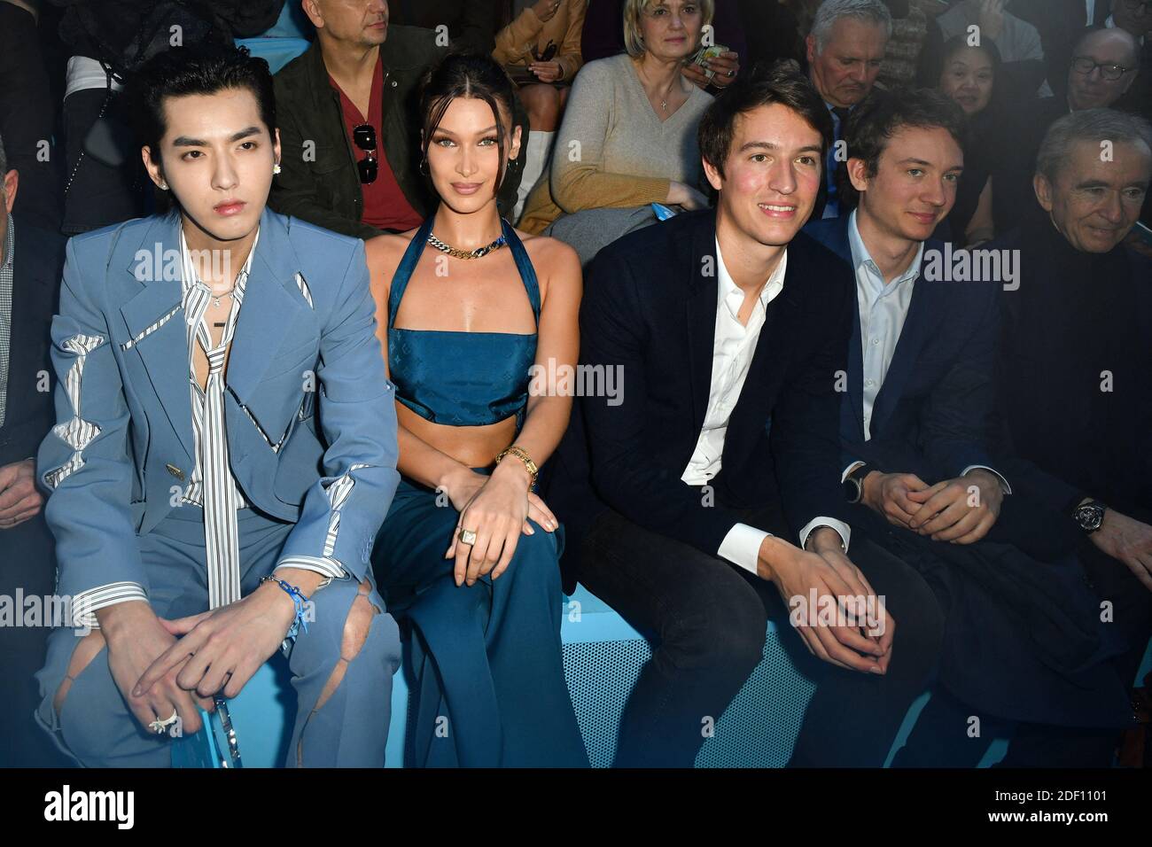 Model Bella Hadid, CEO of Rimowa, Alexandre Arnault, Frederic Arnault and  Owner of LVMH Luxury Group Bernard Arnault attend the Louis Vuitton  Menswear Fall/Winter 2020-2021 show as part of Paris Fashion Week