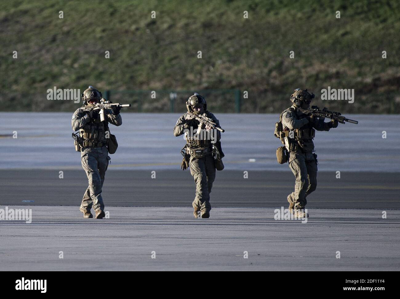 Soldiers of French air force special forces (commando parachutiste de lâÂ€Â™ air n°10) perform a demonstration with their Caracal helicopter on January  16, 2020 at the air base 123 of Orleans-Bricy, central France,