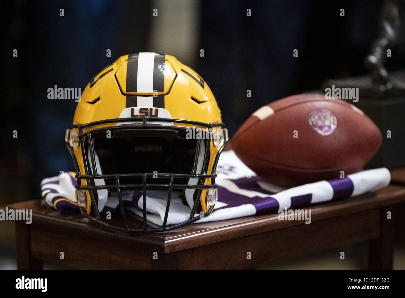 A football helmet and ball are displayed on a table as U.S. President Donald Trump, not pictured, hosts an event honoring the team in the East Room of the White House in Washington, D.C., U.S., on Friday Jan. 17, 2020. The team was invited to the White House in recognition of their winning the 2019 NCAA football championship on Monday. Photo by Al Drago/Pool/ABACAPRESS.COM Stock Photo