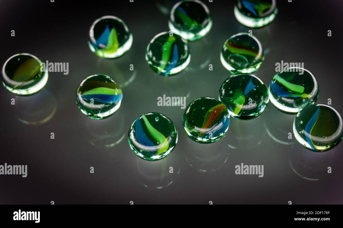 colored glass marbles and reflections Stock Photo