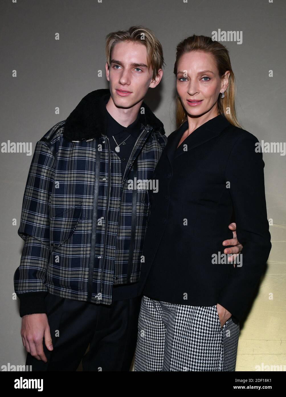 Uma Thurman and her son Levon Roan Thurman-Hawke attend the Dior Haute