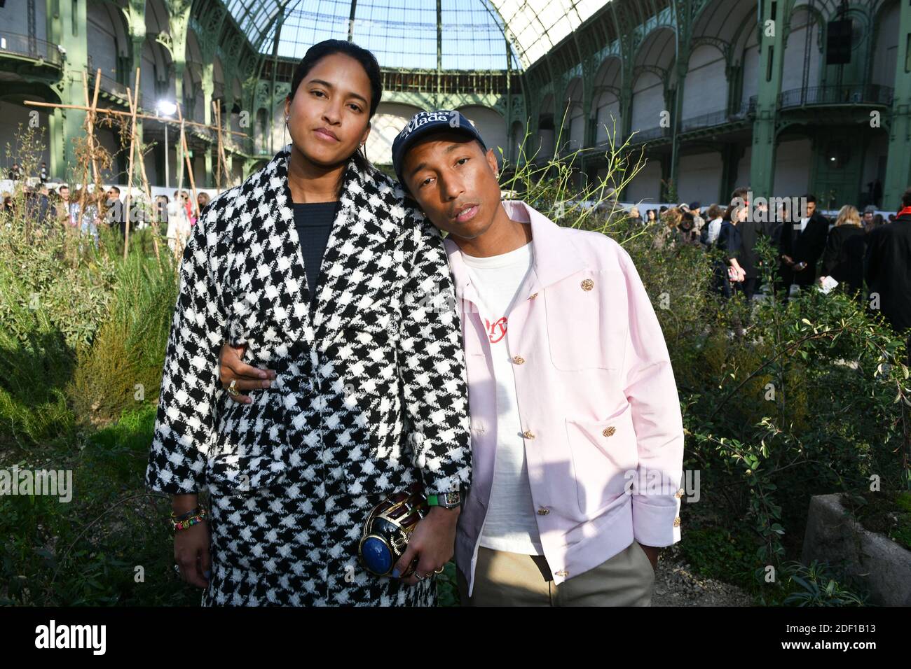 Helen Lasichanh and her husband Pharrell Williams attend the Chanel