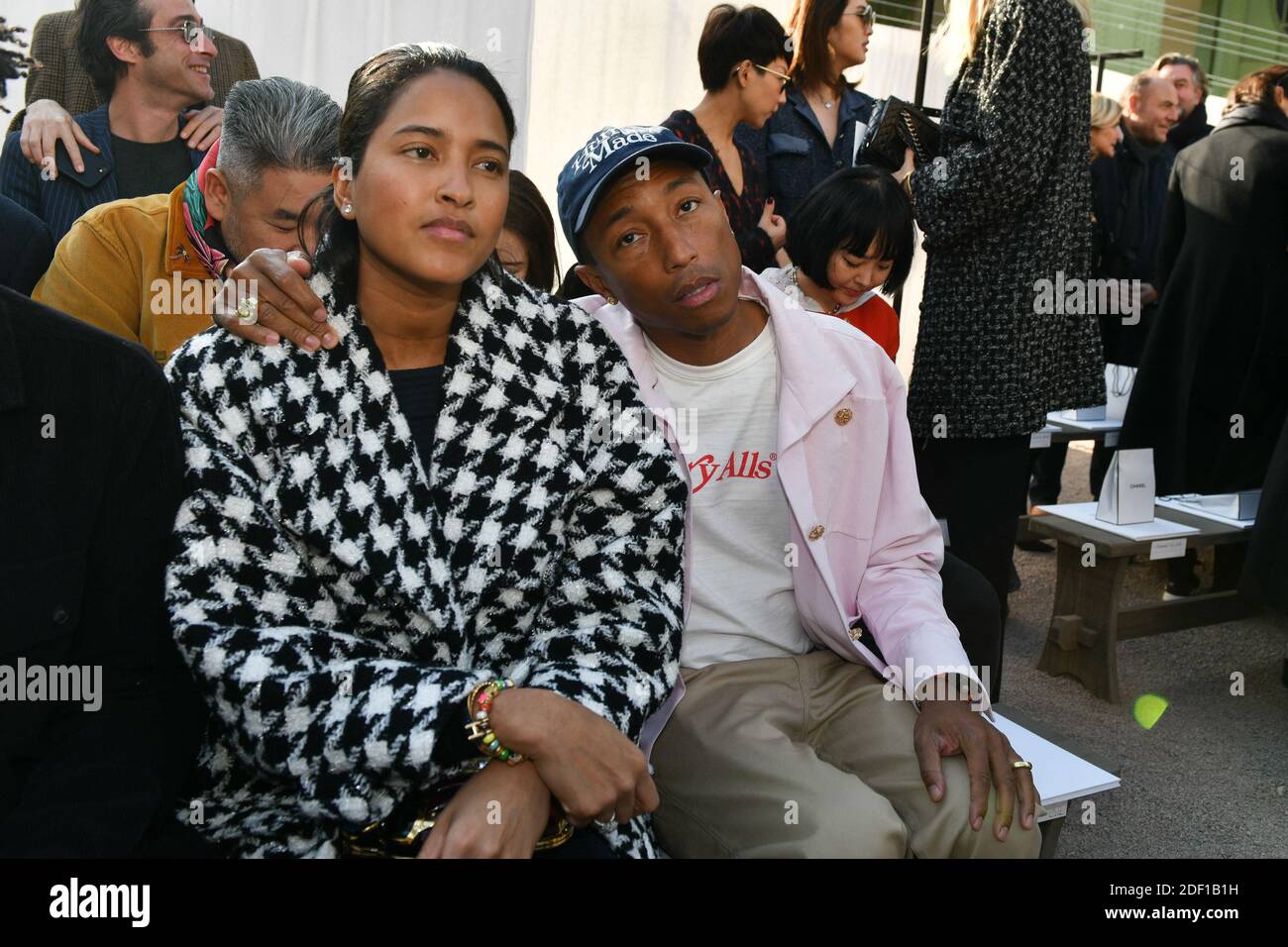 Helen Lasichanh and her husband Pharrell Williams attend the Chanel