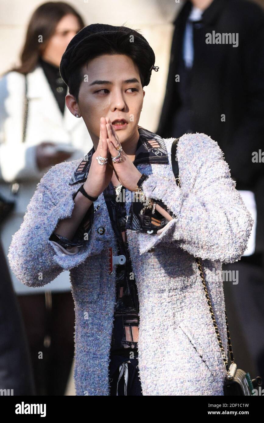 G-Dragon attends the Chanel show as part of the Paris Fashion Week